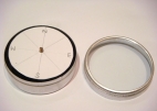 Working compass sat on a desk