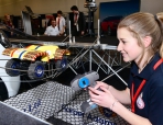 Girl with remote control model car